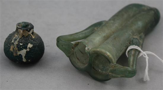 Two Roman green glass vessels, c.2nd century AD, 12cm